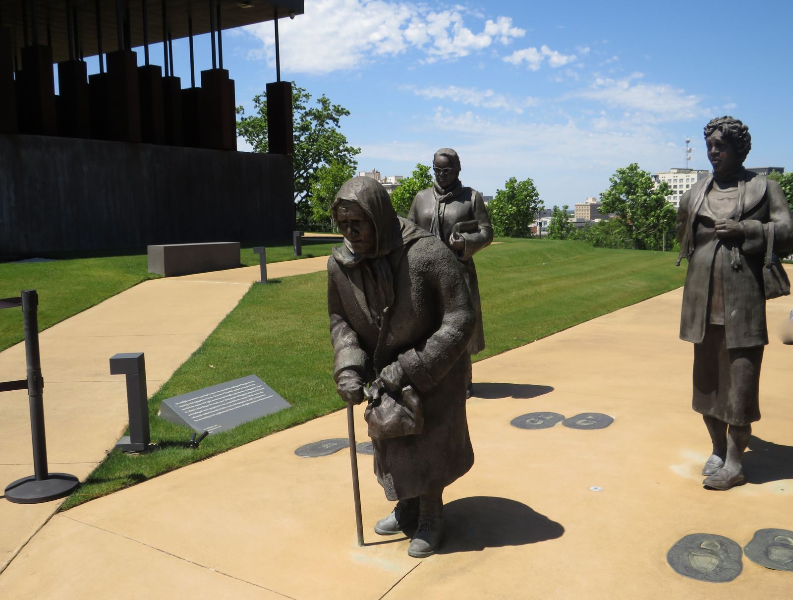 Bronze statues of women walking at a memorial park in Montgomery, a stop on the Alabama civil rights trail